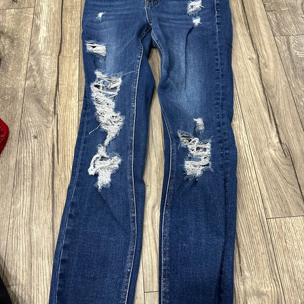 Distressed Blue Jeans